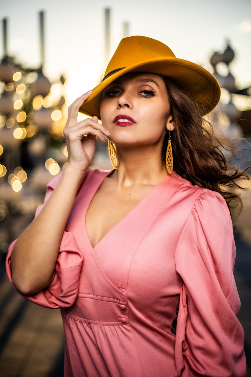 Stylish woman in pink dress and wide-brimmed hat - races outfit inspiration