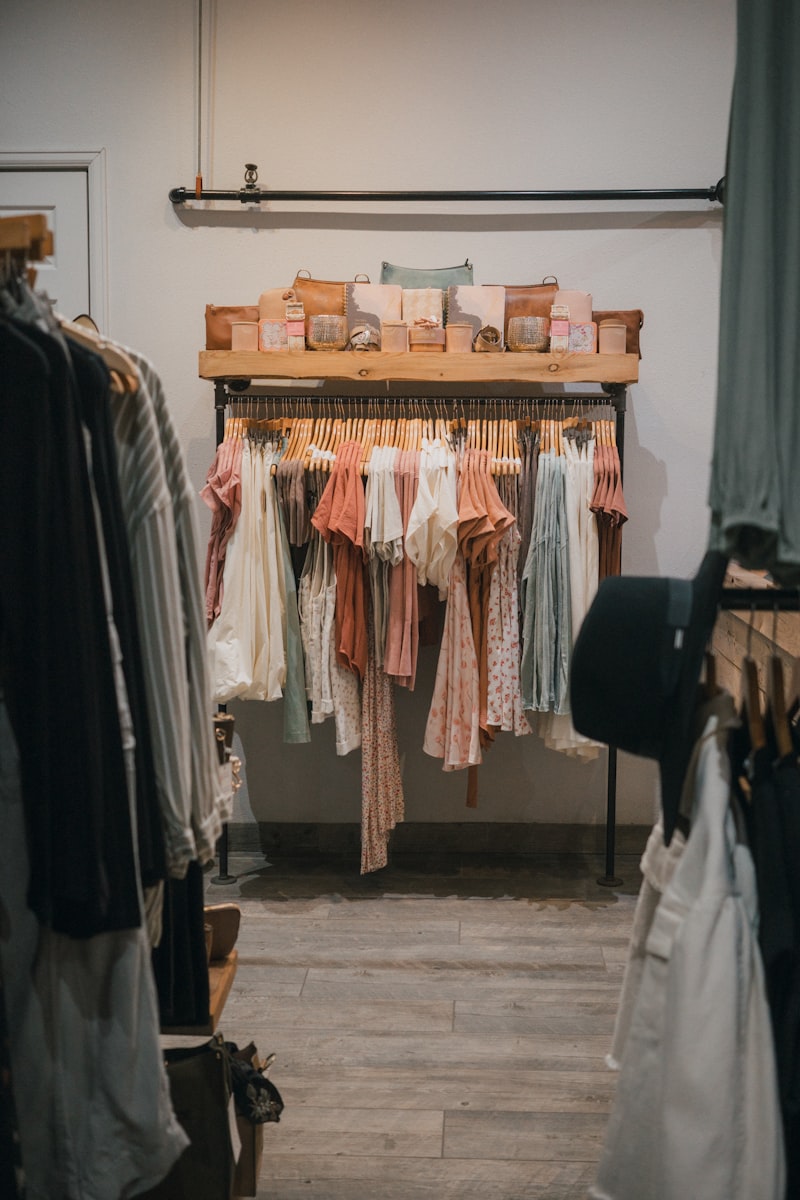 Dress rack in boutique - rent vs buy comparison for occasion wear